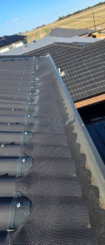 Grayson's Gutter Guard Geelong gutter cleaning work in Armstrong Creek