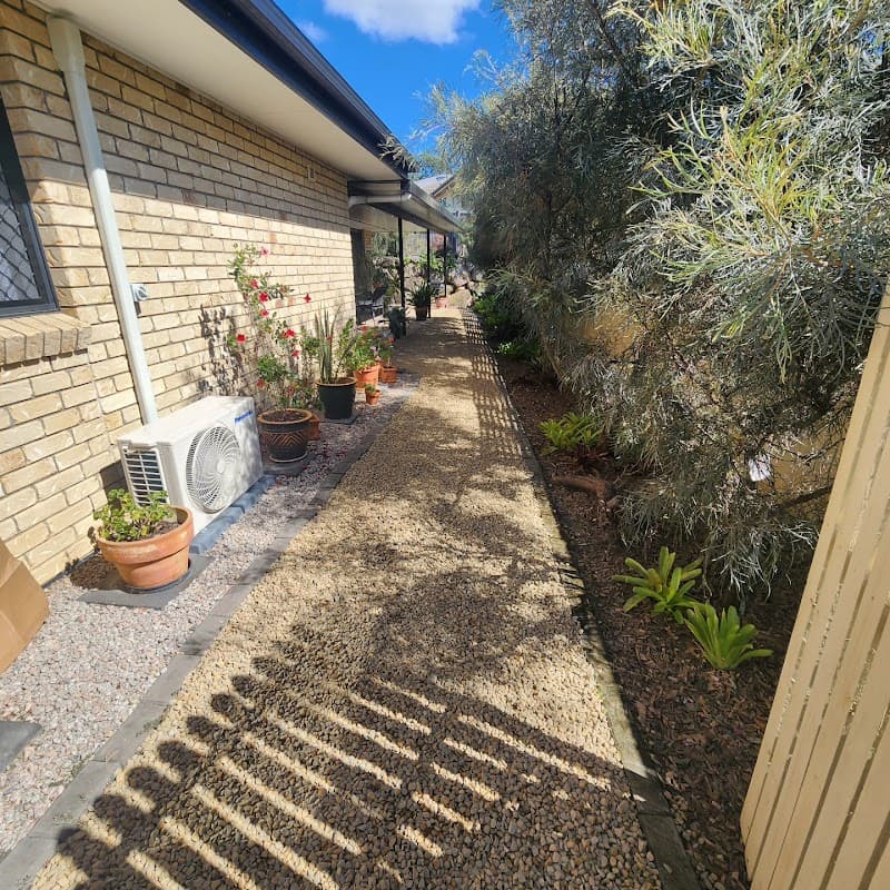 JW Lawn and Garden Care lawn care work in Brassall