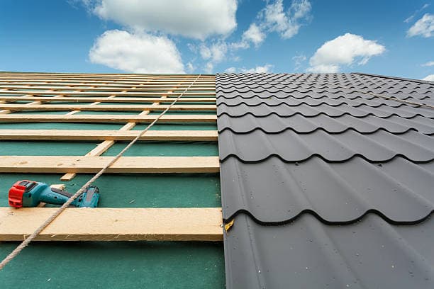 Lake Mac Roof Restoration gutter cleaning work in Swansea