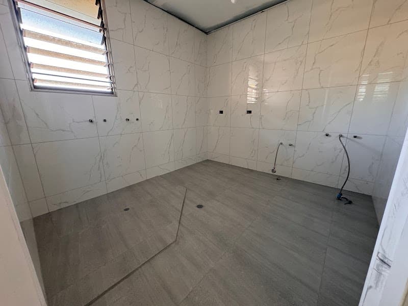 MR Tiling Services PTY LTD tiling work in Wulagi