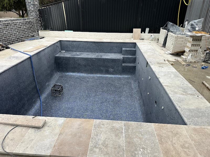 Pak Pools Pebbles and Tiling pool builder work in Harris Park