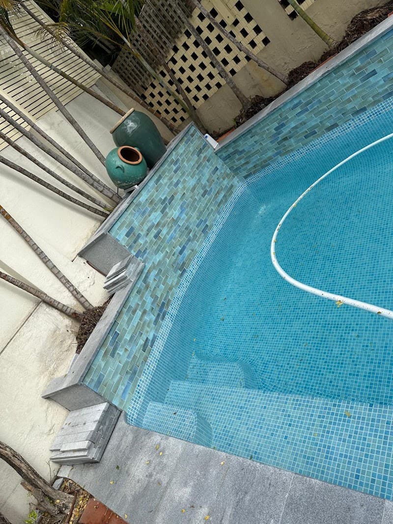 Pak Pools Pebbles and Tiling pool builder work in Harris Park